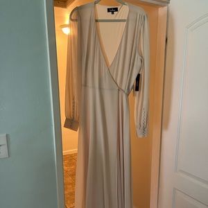 Lulus wrap dress in cream with button detail on the sleeve